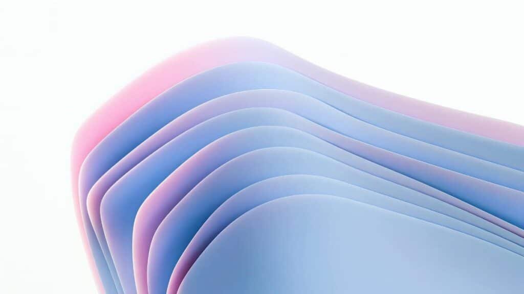 Smooth gradient waves in pastel colors create a modern abstract art design.