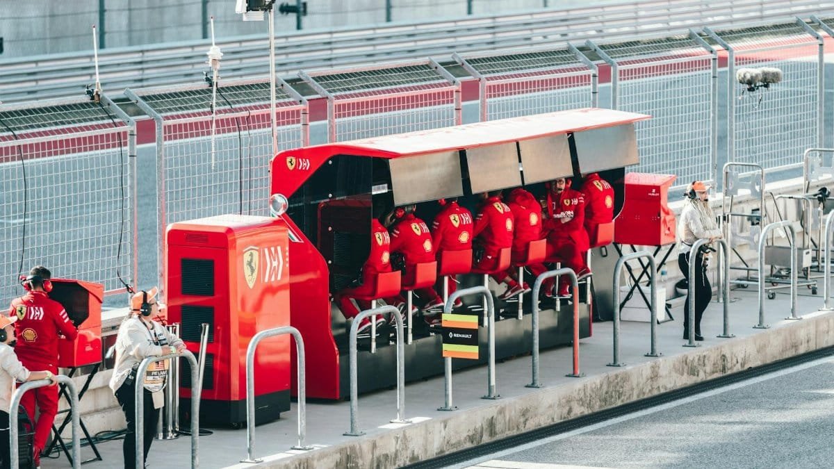 Motorsport team actively working at a race track pit stop in Austin, Texas.