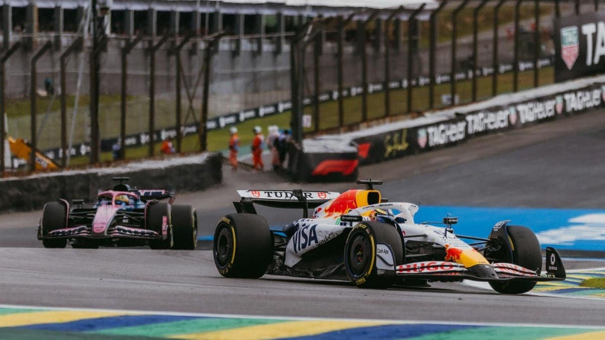 Exciting Formula 1 action with red bull cars racing in São Paulo, Brazil.