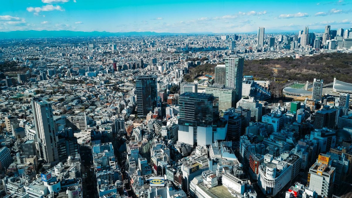 A stunning aerial shot of Tokyo showcasing its sprawling urban skyline and famous landmarks.