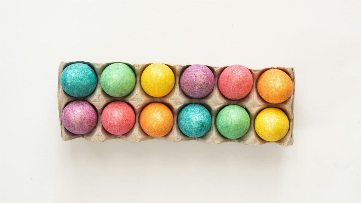 Beautifully dyed eggs in an array of vibrant colors, ideal for Easter celebrations.