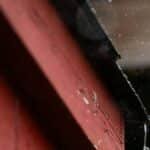 Raindrop dripping from a red roof in Canonsburg, PA. Captures essence of rainy fall day.