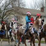 Free stock photo of active people, christmas parade, colorful parade