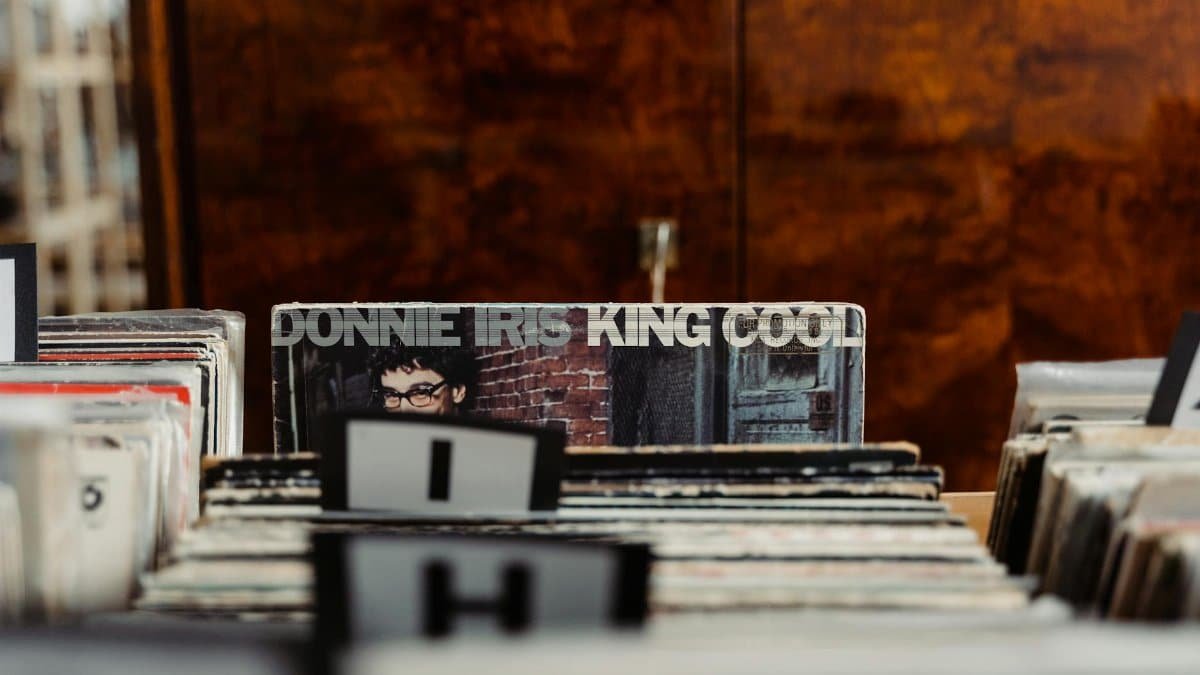 Explore a classic vinyl record collection in a vintage music store setting.