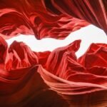 Stunning view of Antelope Canyon's red sandstone waves sculpted by nature in Page, Arizona.