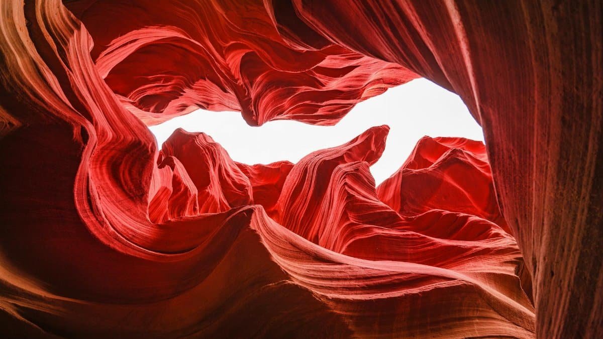 Stunning view of Antelope Canyon's red sandstone waves sculpted by nature in Page, Arizona.