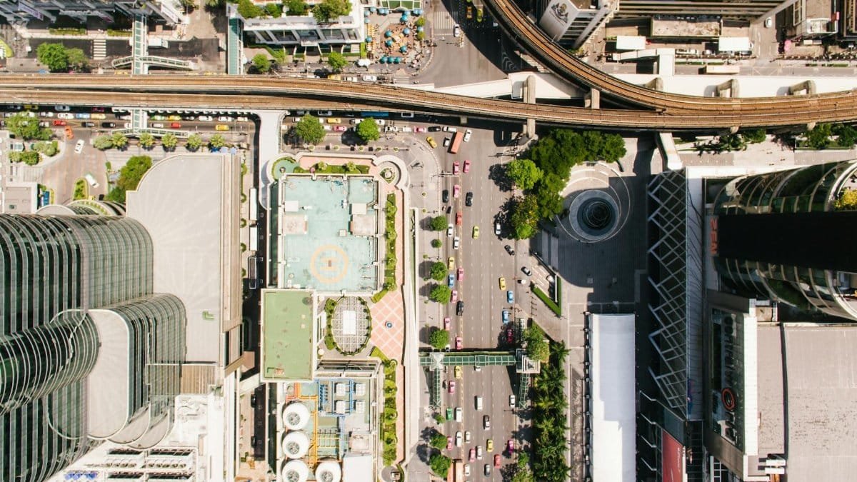 High-resolution aerial view of bustling Bangkok city streets and modern architecture.