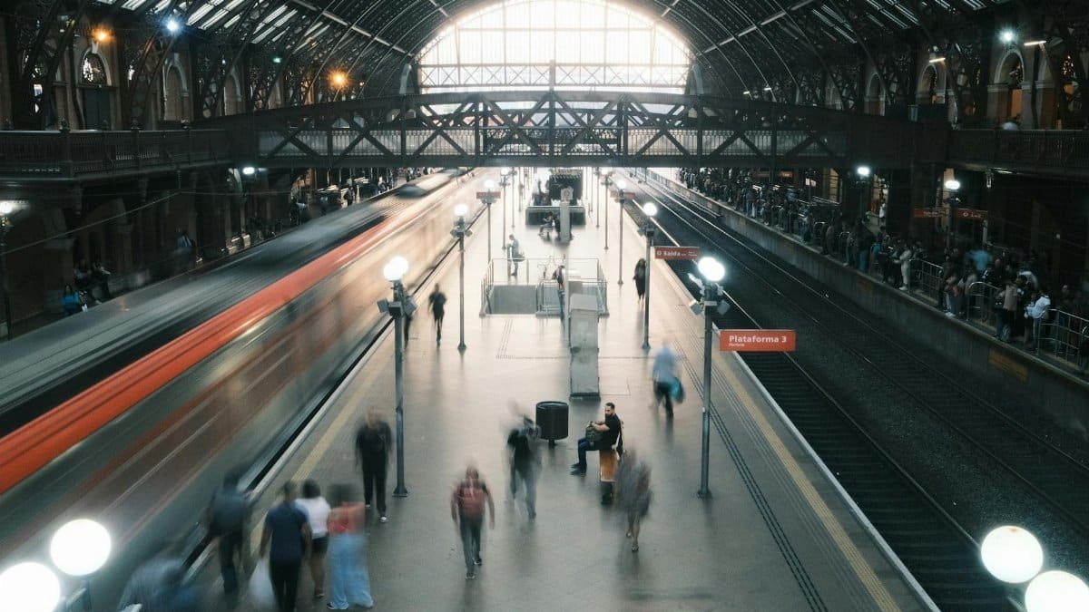 Vibrant city train station with blurred motion capturing commuting energy.