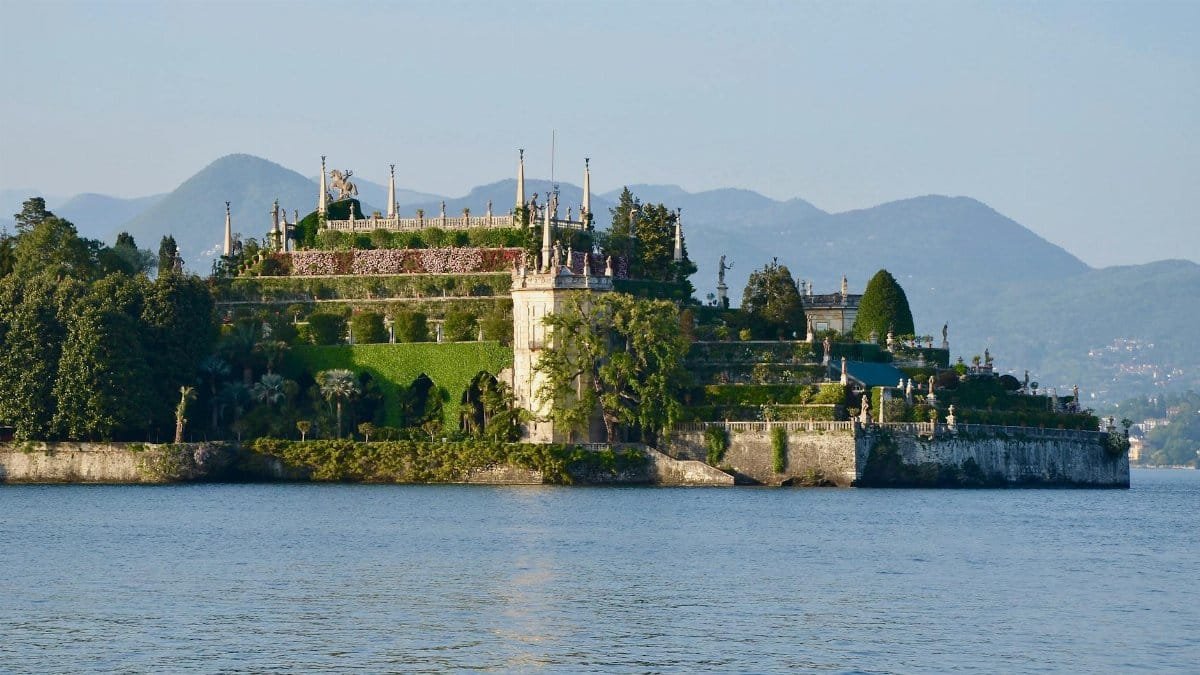 Explore the magnificent gardens and scenic views of Isola Bella in Piemonte, Italy, captured in vibrant daylight.