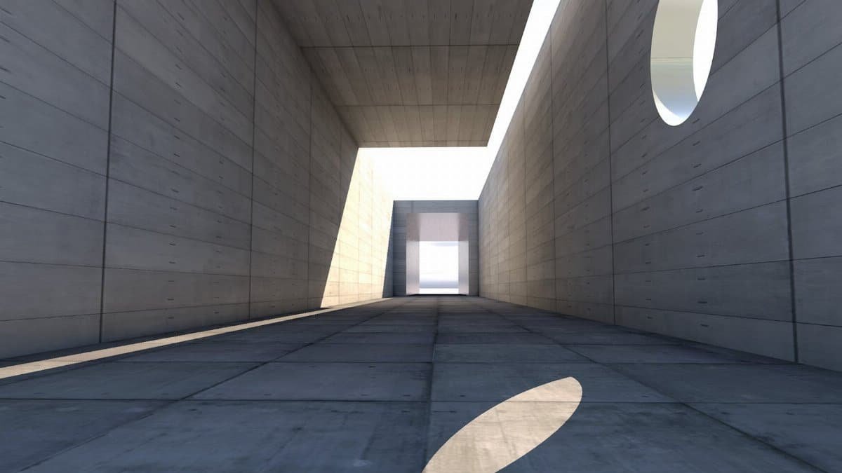Concrete passage showcasing modern architecture with dramatic light and shadow play.
