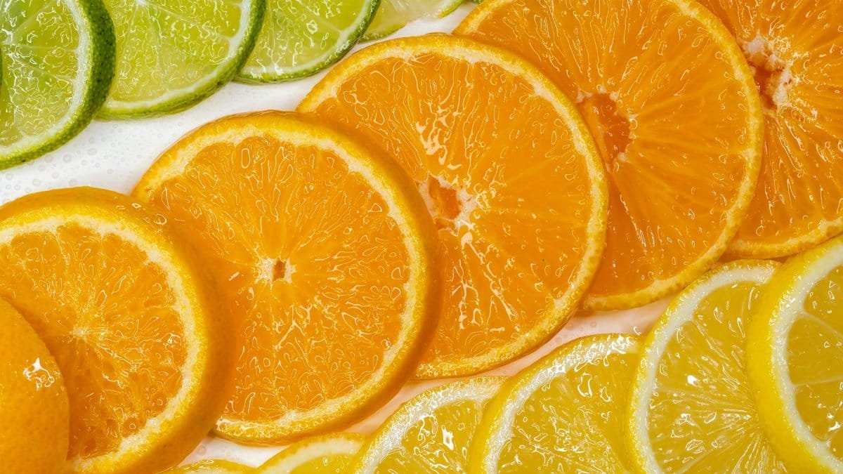 Colorful citrus slices of lime, orange, and lemon, highlighting freshness and nutrition.