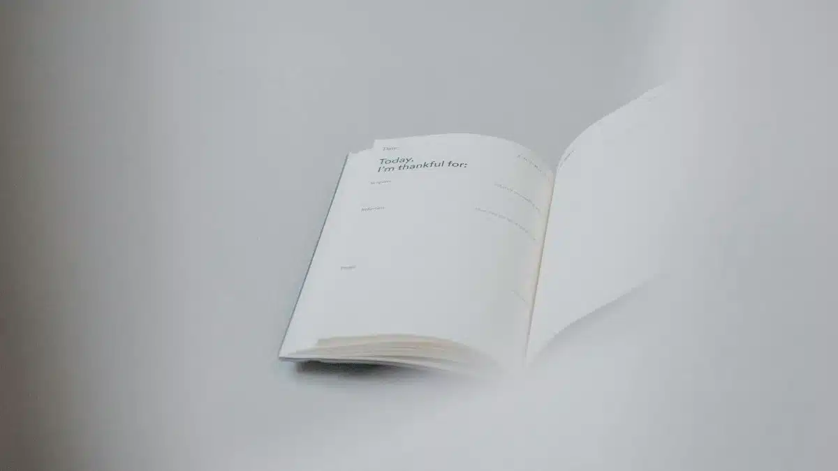 Open notebook displaying daily gratitude prompts, perfect for planning and reflection.