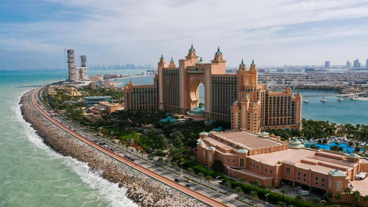 A breathtaking drone shot of Atlantis, The Palm resort in Dubai, highlighting the luxurious urban landscape.
