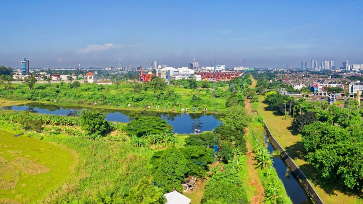 Scenic aerial view of greenery and cityscape in Pondok Aren, Indonesia.