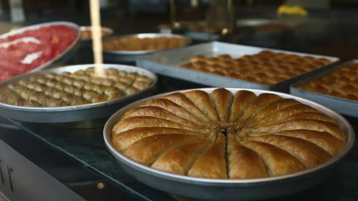 Close-up of various baklava trays on display in a Gaziantep sweet shop, Turkey.