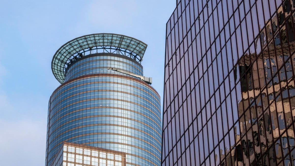 Stunning view of modern skyscrapers reflecting in Minneapolis, showcasing architectural elegance.