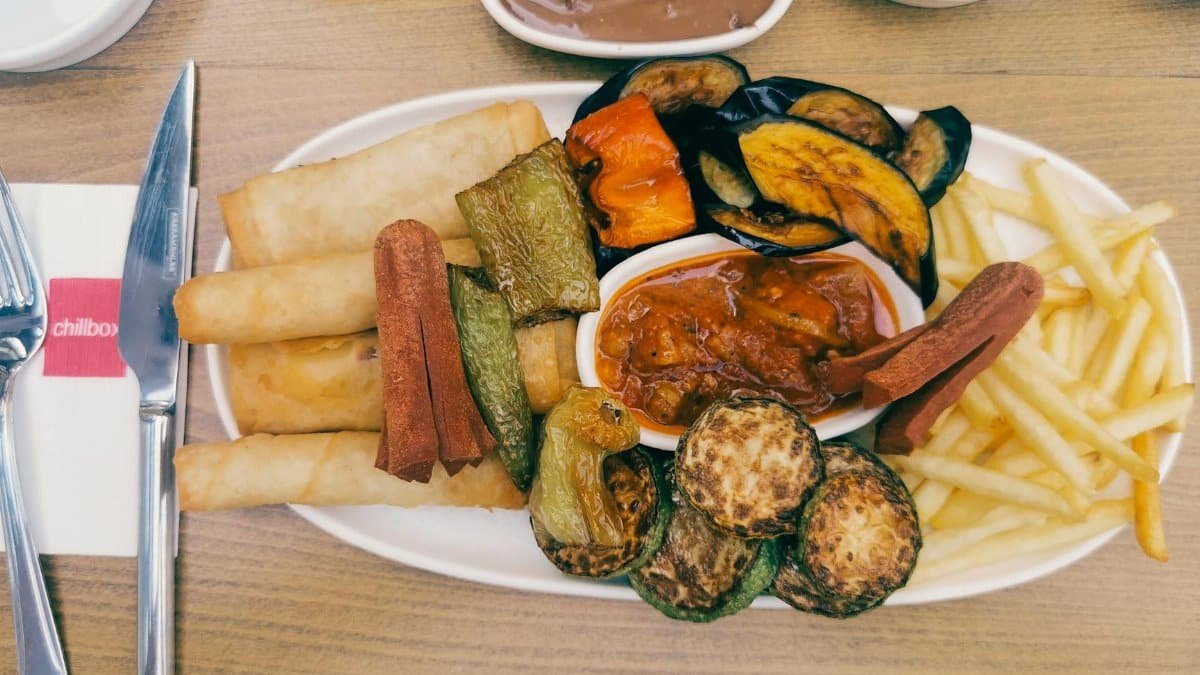 A diverse mix of fried vegetables, draws, and dips served in Gaziantep, Turkey.