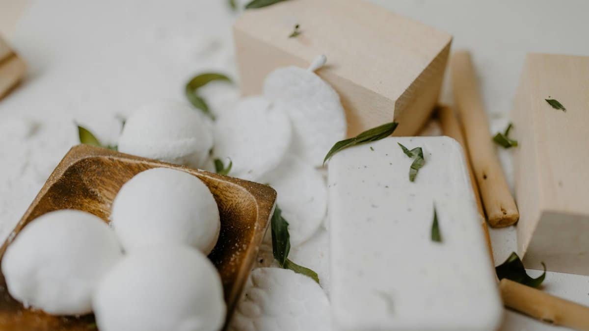 Elegant arrangement of spa essentials with natural soap and bath bombs, perfect for self-care routines.