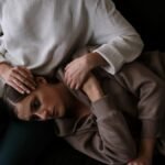 Two people share an intimate moment, symbolizing comfort and emotional support.