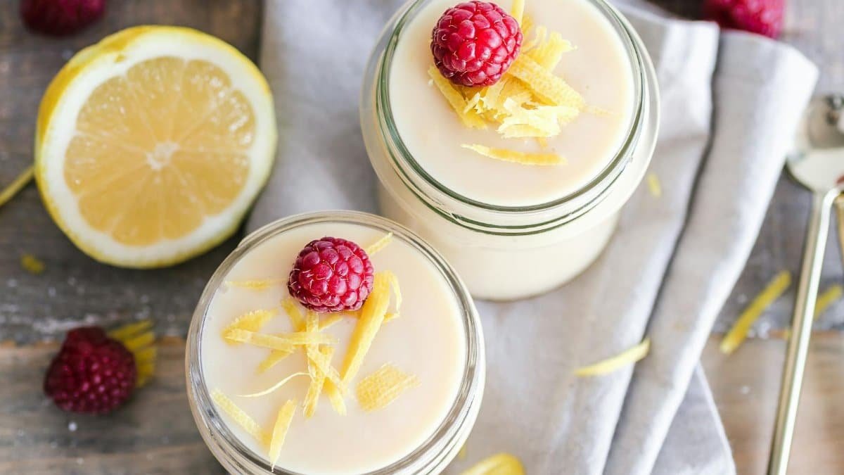 Fresh lemon raspberry yogurt in mason jars, perfect for a refreshing dessert.