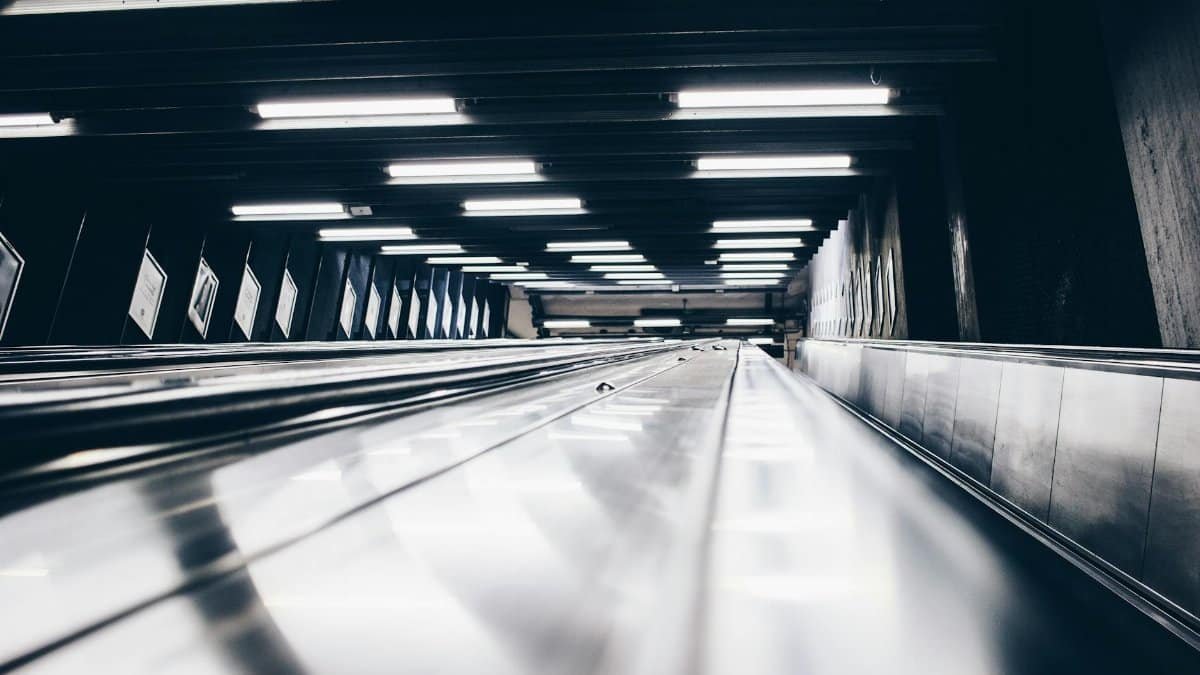 Capture of a dramatic underground escalator in Stockholm's urban subway system.