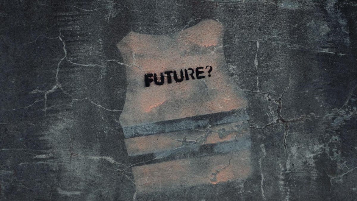 Street art in Venice with text 'FUTURE?' on cracked concrete wall.