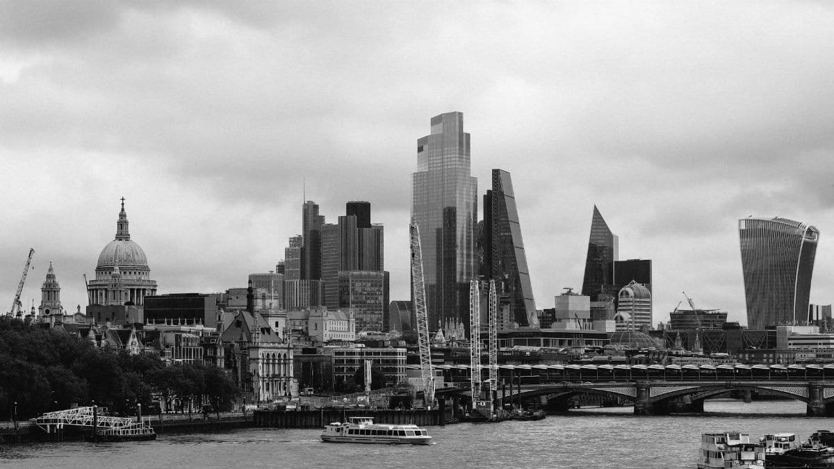 Stunning black and white photo of London's skyline featuring historic architecture and modern skyscrapers.