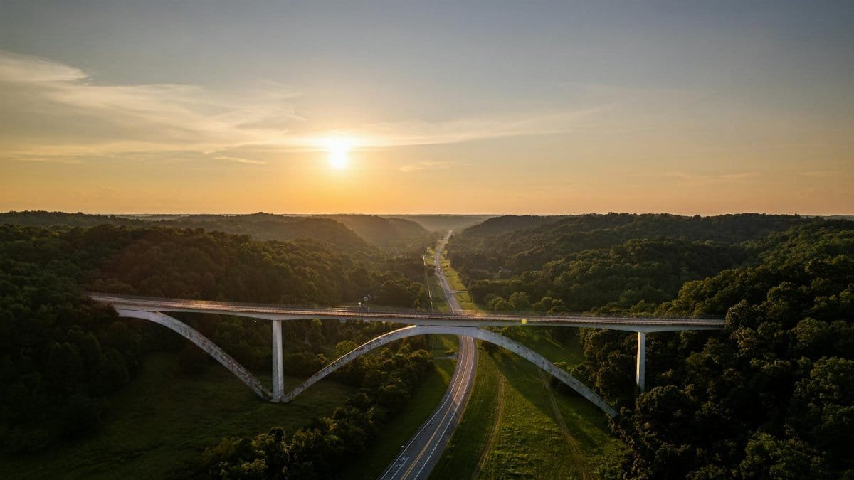 Stunning aerial shot of Natchez Trace Bridge in Nashville with a captivating sunset view.