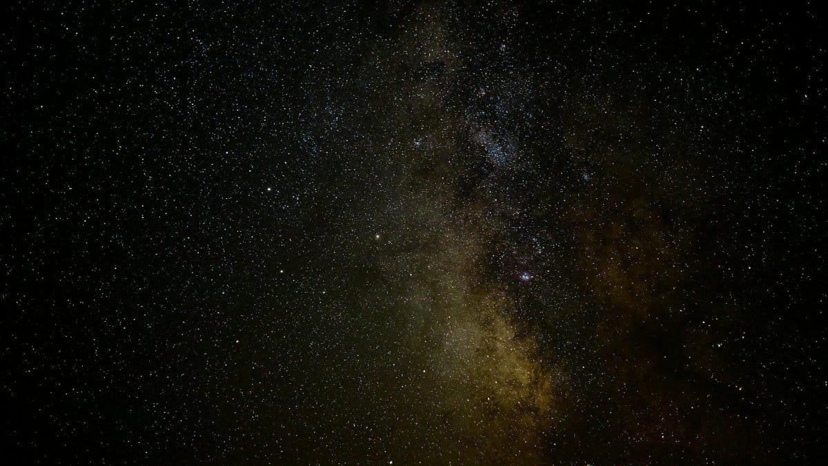 A breathtaking night sky showcasing the Milky Way galaxy, filled with countless stars and celestial formations.