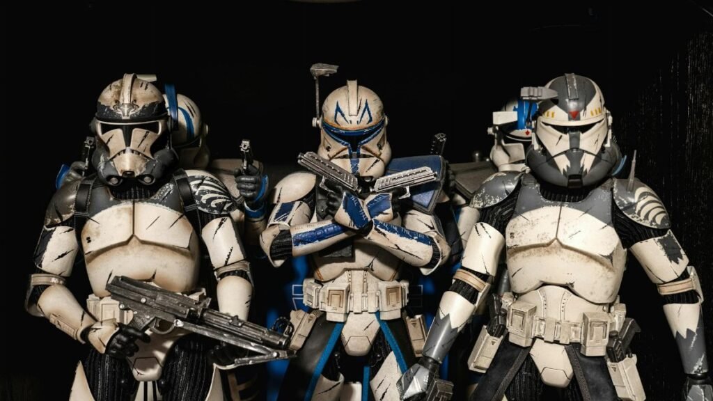 Detailed shot of Star Wars clone trooper action figures in combat-ready stance.