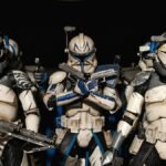 Detailed shot of Star Wars clone trooper action figures in combat-ready stance.
