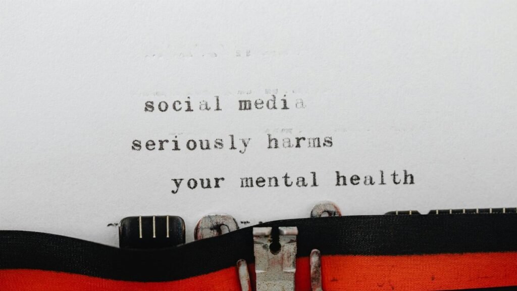 Vintage typewriter conveying message on social media's impact on mental health.