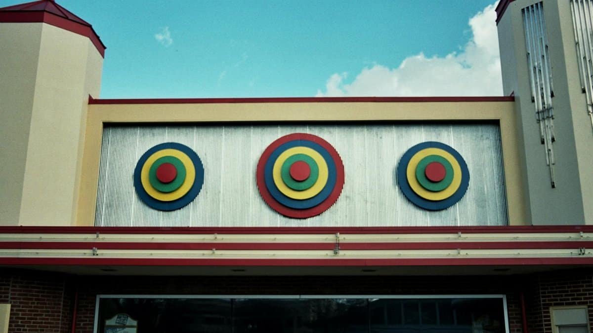 Colorful Art Deco building facade with geometric designs at Glen Echo Park, Maryland.