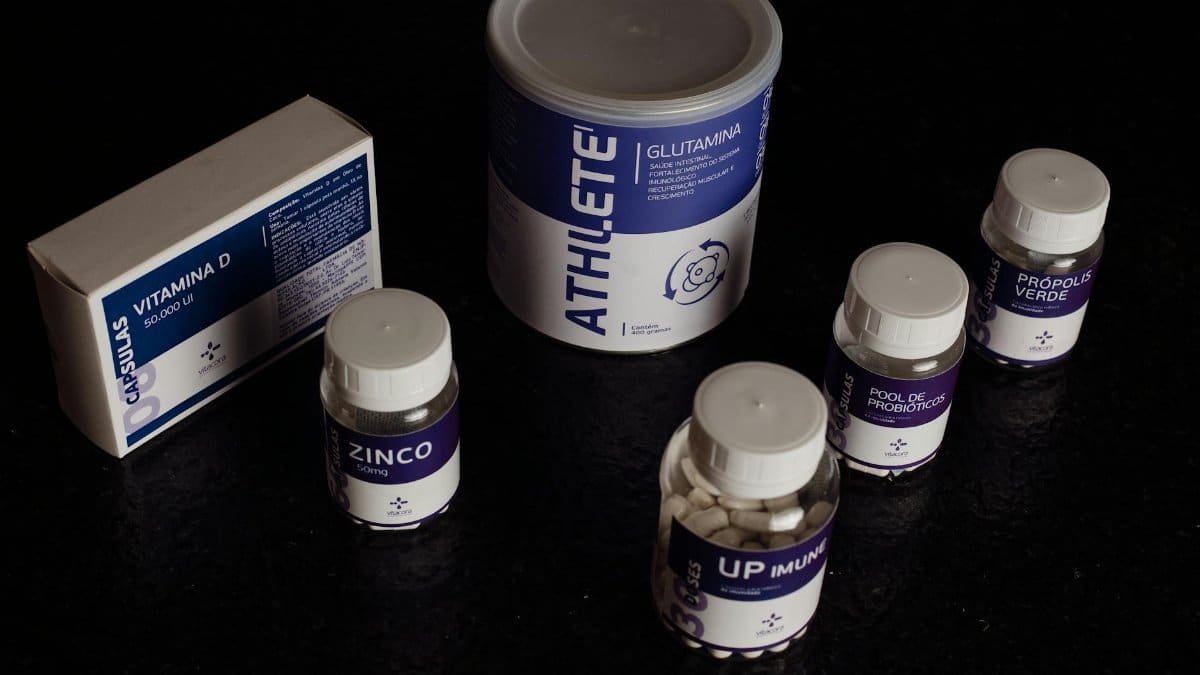 Close-up of a variety of nutritional supplements, vitamins, and probiotics.