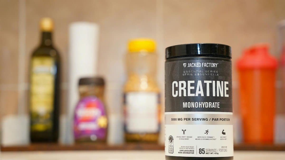 Creatine monohydrate from Jacked Factory displayed on a kitchen counter.