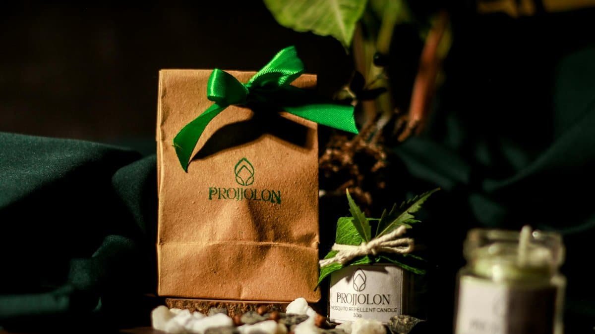 Eco-friendly candle making kit featuring Projjolon products and natural decor, shot in Dhaka, Bangladesh.