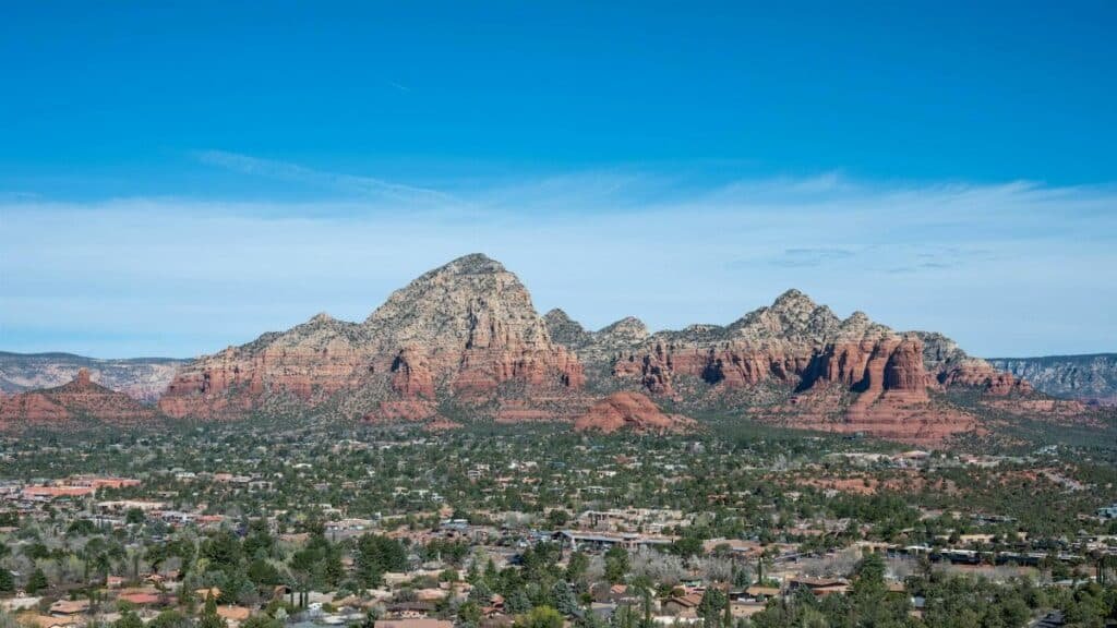 Scenic view of Sedona's stunning red rock formations under a clear blue sky.