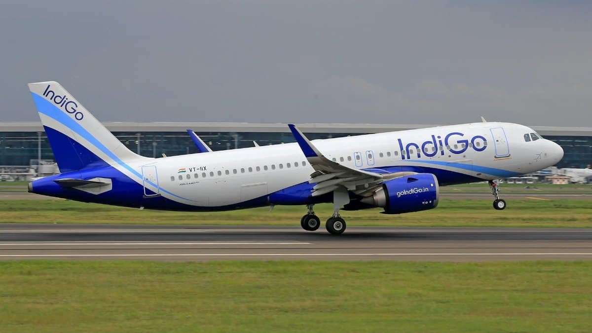 IndiGo Airbus A320 jet taking off from an airport runway, perfect for travel and aviation themes.