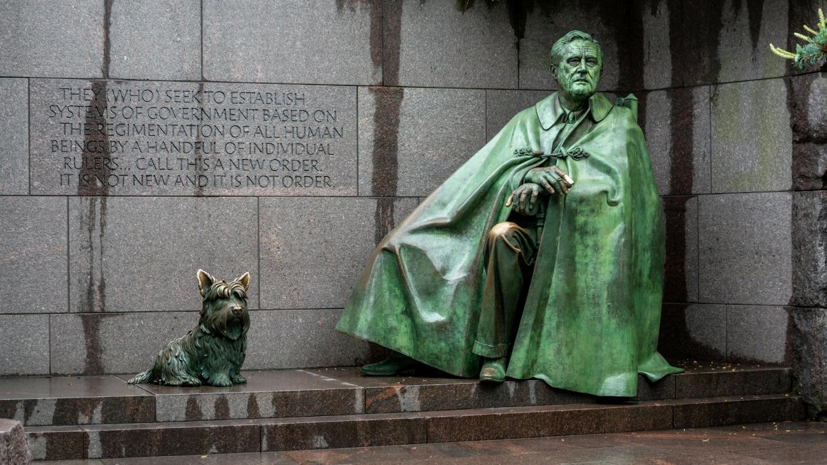 Bronze statue of Franklin D. Roosevelt with his dog at the memorial in Washington D.C.