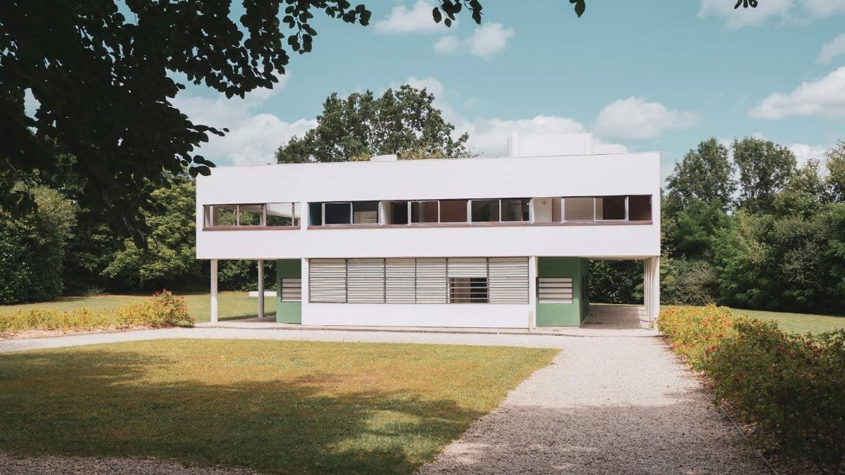 Modernist architecture villa surrounded by greenery in Paris, France.