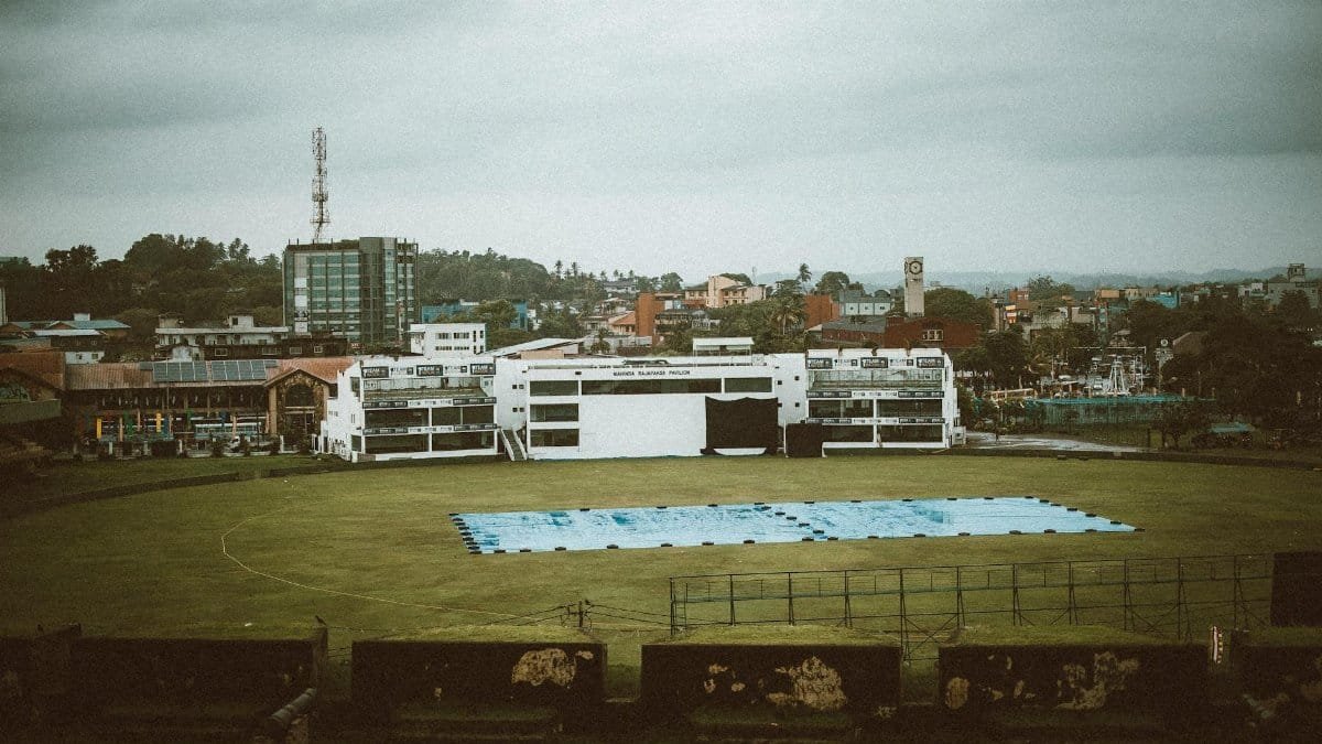 Aerial view of Galle International Stadium overlooking the city skyline in Sri Lanka.