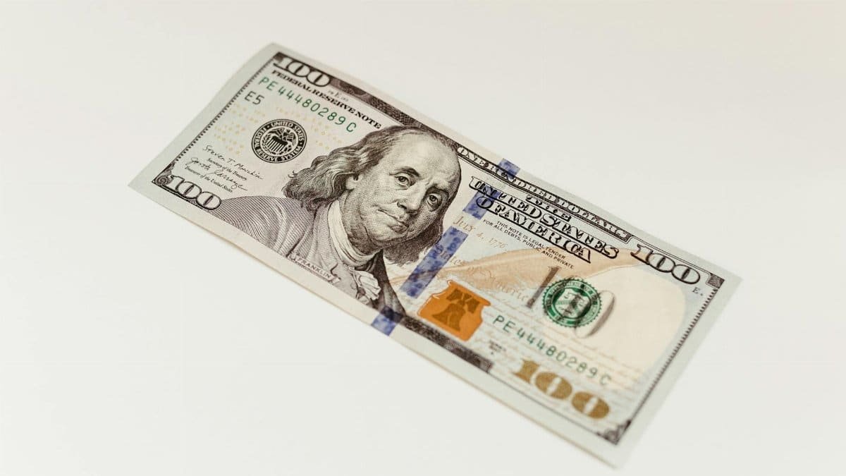 High-quality close-up of a one hundred dollar bill, ideal for finance and business themes.