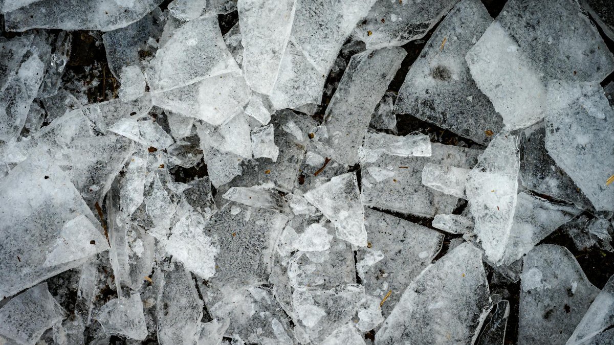 A detailed view of broken ice pieces creating an abstract winter scene.