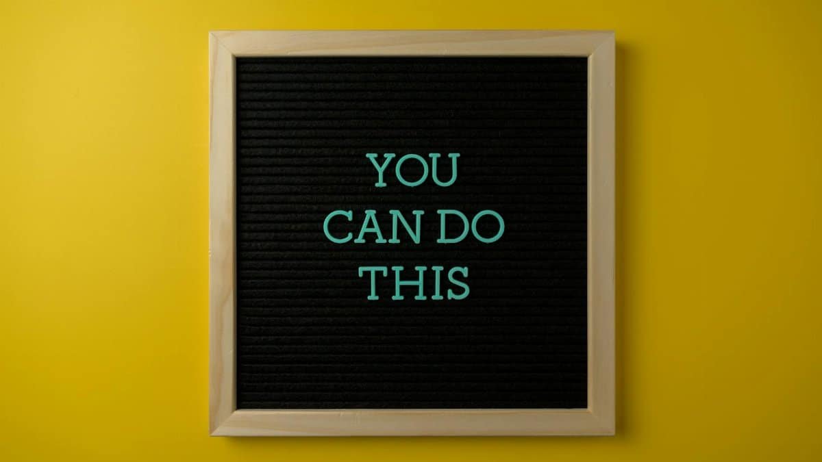 Inspirational message 'You Can Do This' displayed on a blackboard with a bold yellow backdrop.