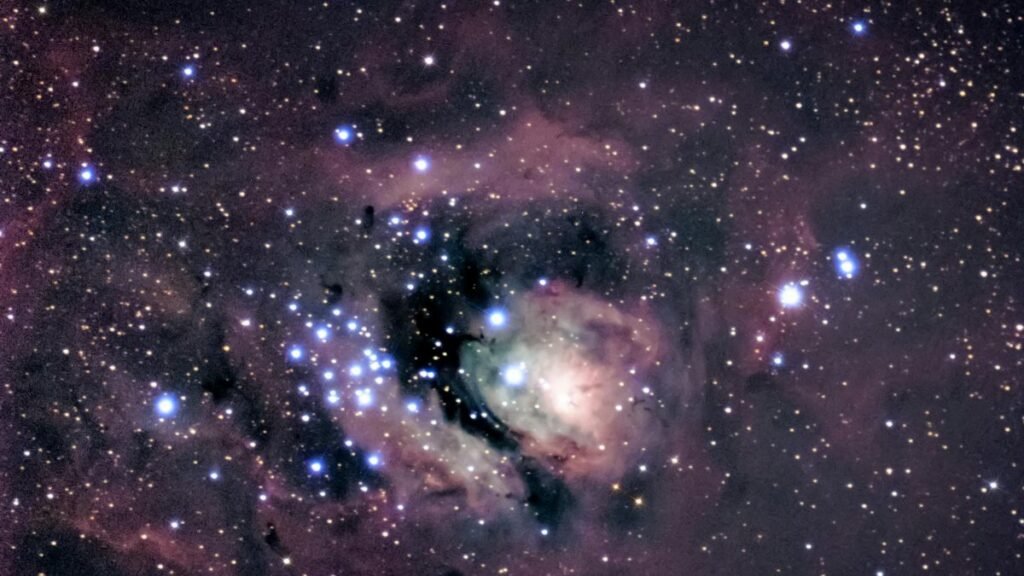 Stunning view of a nebula and star clusters illuminating the night sky.