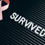 Pink ribbon and 'survived' text symbolize breast cancer awareness and survivorship.
