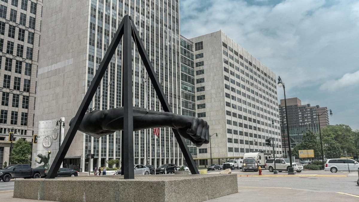 Urban scene featuring the iconic Joe Louis Fist in downtown Detroit.