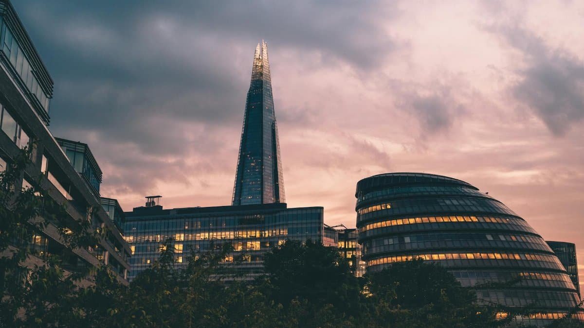View of The Shard and cityscape in London during a dramatic sunset.