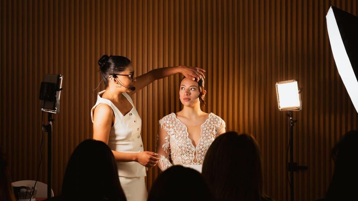 Elegant bridal makeup session with a professional makeup artist at a wedding event in Mexico City.