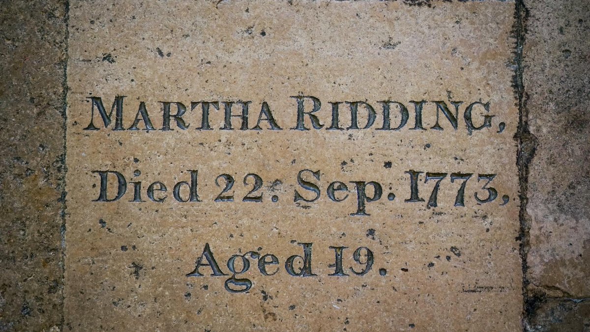 Historic memorial plaque of Martha Ridding dated 1773 in Salisbury, England.
